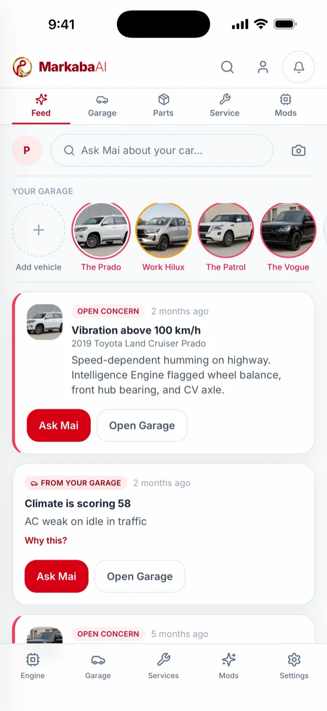 The app feed with a garage of four vehicles and an open concern card for a vibration above 100 km/h.